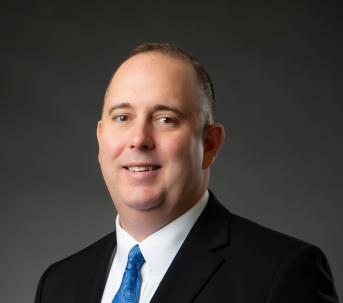 Finance Commissioner, Mick Campbell's headshot