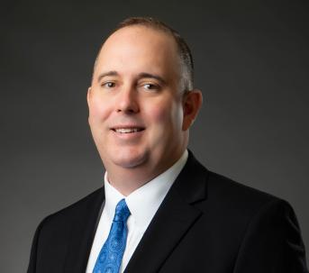 Finance Commissioner, Mick Campbell's headshot